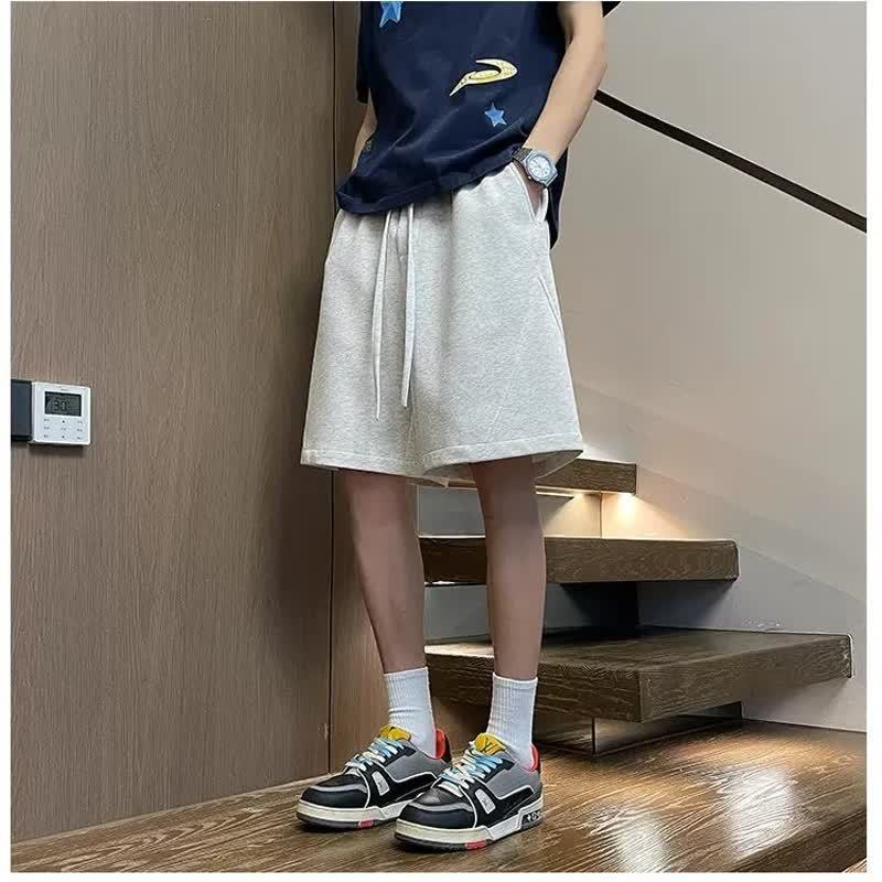 Short sport ample