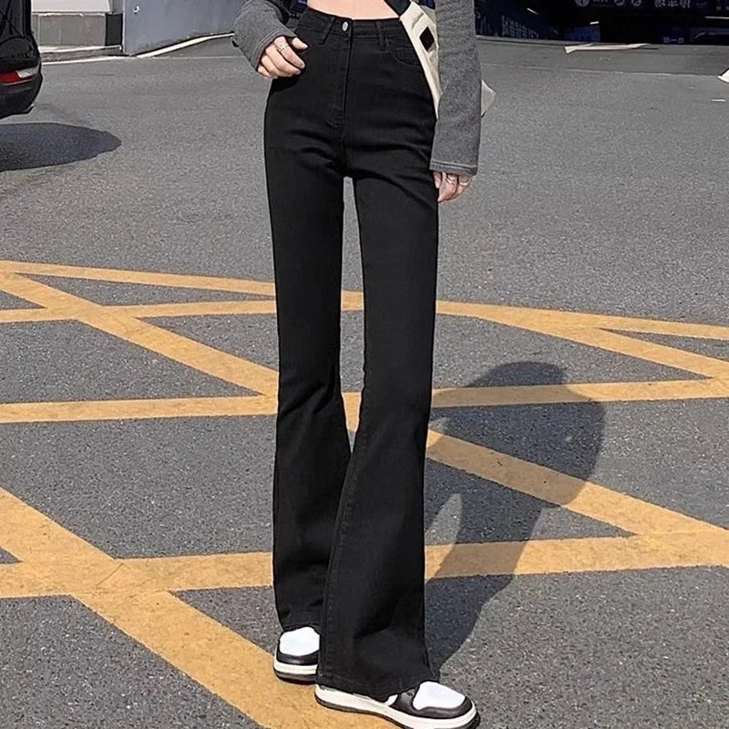 Jean évasé noir taille haute