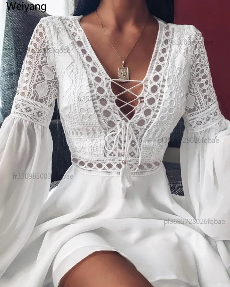 Robe courte à volants manches longues