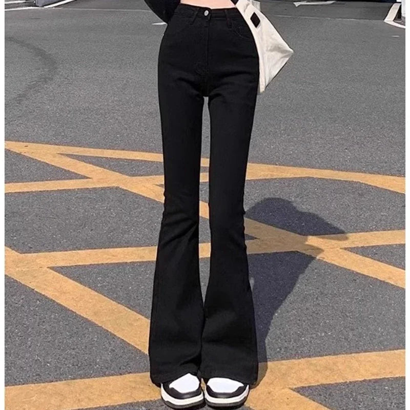 Jean évasé noir taille haute