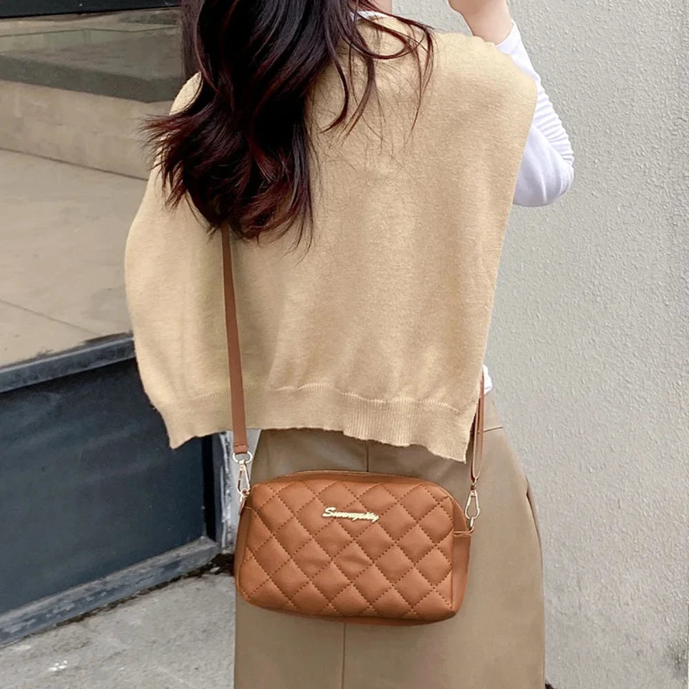 Sac bandoulière à pompon
