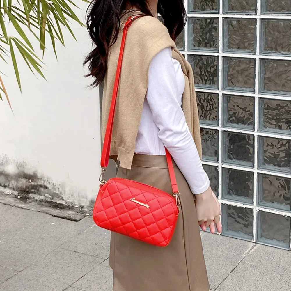 Sac bandoulière à pompon