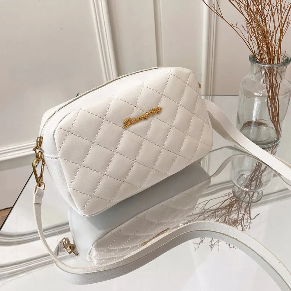 Sac bandoulière à pompon
