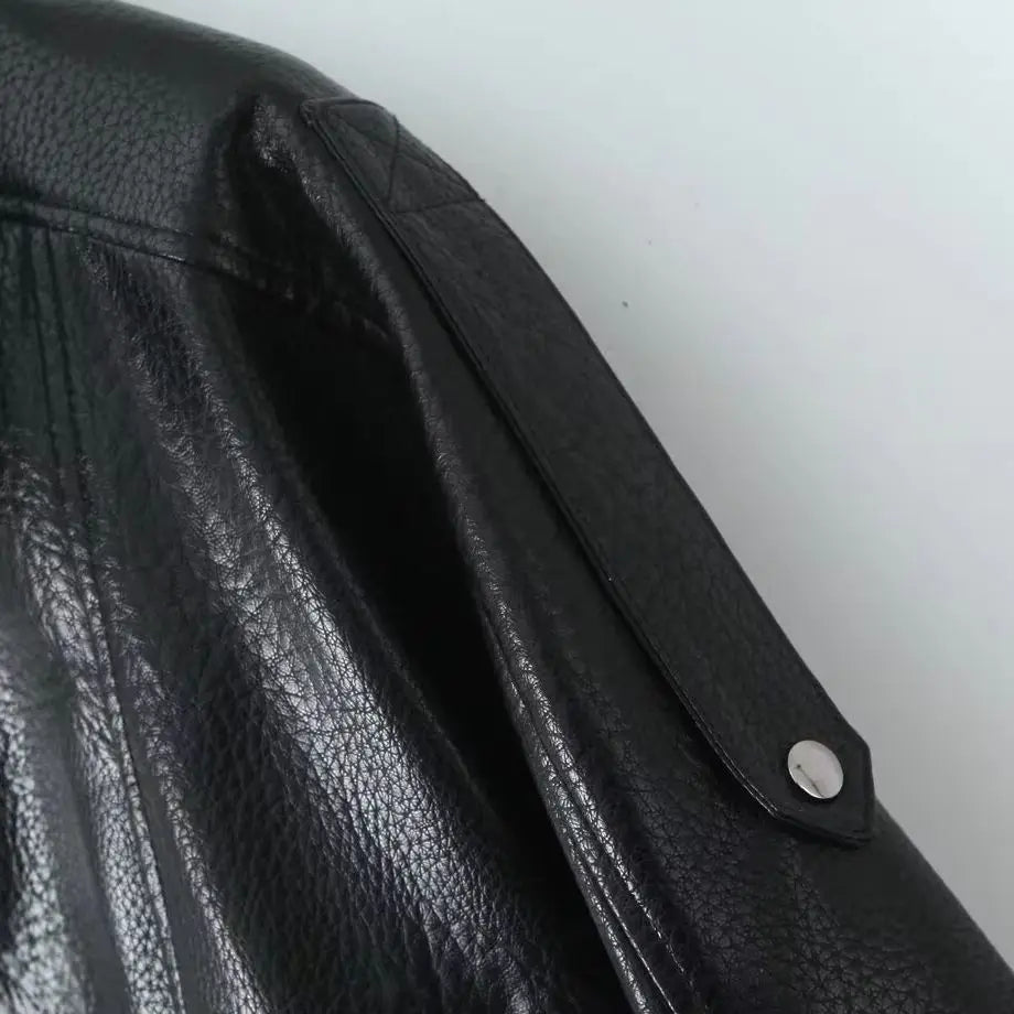 Veste courte effet cuir à ceinture